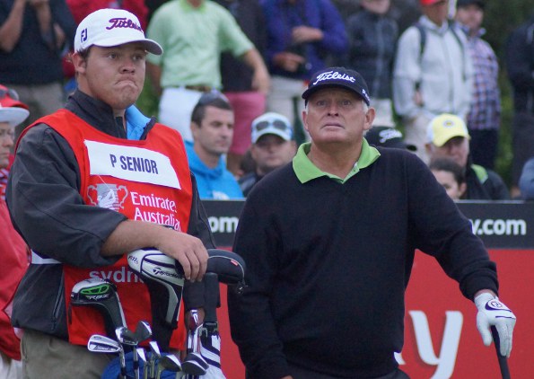 Peter Senior and son Mitch on the 18th tee on the final hole of the 2012 Australian Open at The Lakes in Sydney. Senior scored an historic victory.